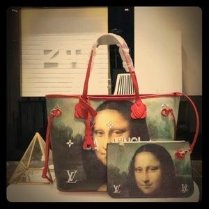 LV Da Vinci handbag